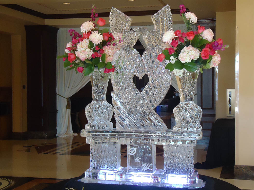 https://www.hoticeinc.com/wp-content/uploads/2019/09/Wedding-Ice-Sculptures-015-Large-Ice-Sculpture.jpg